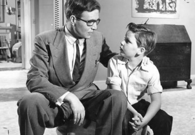 Generic 1960s pic of a father and son scene.